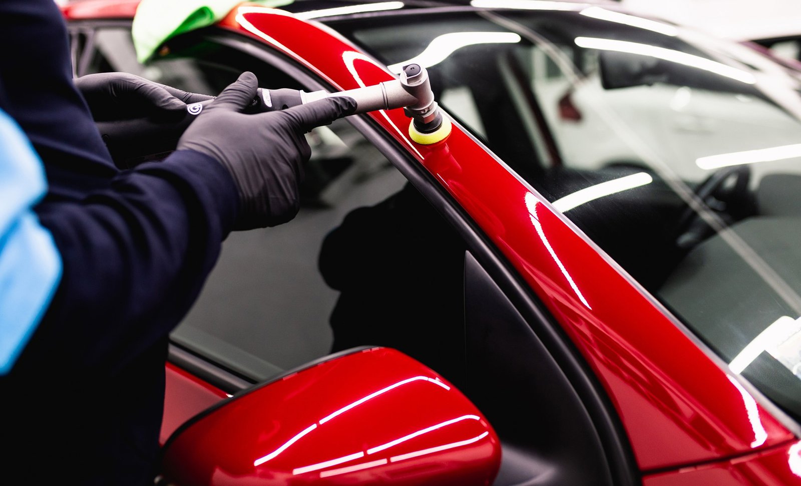 Car Detailing Man With Orbital Polisher